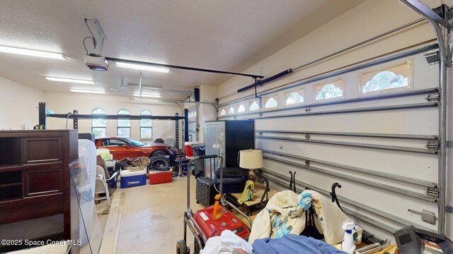5454 Riveredge Dr, Titusville, FL 32780 - garage with a garage door opener