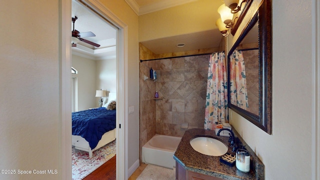 5454 Riveredge Dr, Titusville, FL 32780 - bathroom with ornamental molding, vanity, ceiling fan, shower / bath combination with curtain, and ensuite bath