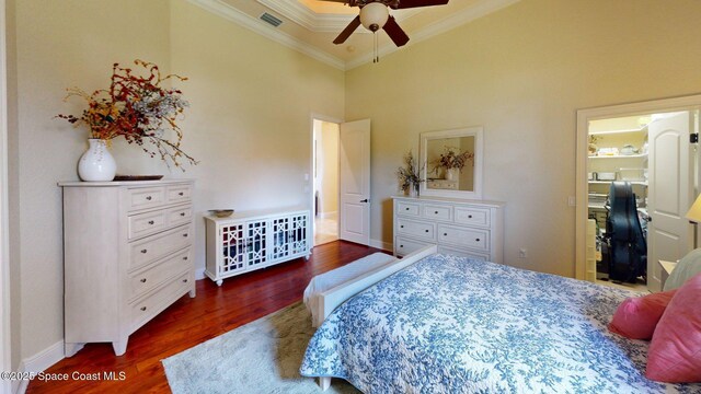 5454 Riveredge Dr, Titusville, FL 32780 - bedroom with crown molding, wood finished floors, a towering ceiling, and baseboards