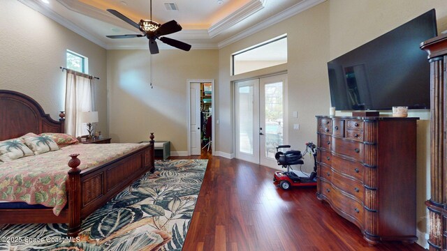 5454 Riveredge Dr, Titusville, FL 32780 - bedroom featuring crown molding, dark wood-style floors, access to exterior, ceiling fan, and a raised ceiling