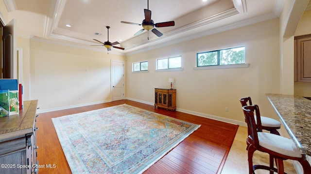 5454 Riveredge Dr, Titusville, FL 32780 - interior space with a raised ceiling, ornamental molding, ceiling fan, wood finished floors, and recessed lighting