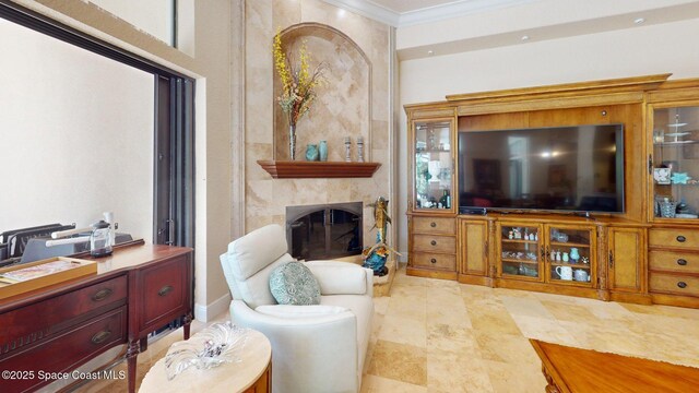 5454 Riveredge Dr, Titusville, FL 32780 - living room with ornamental molding and a glass covered fireplace