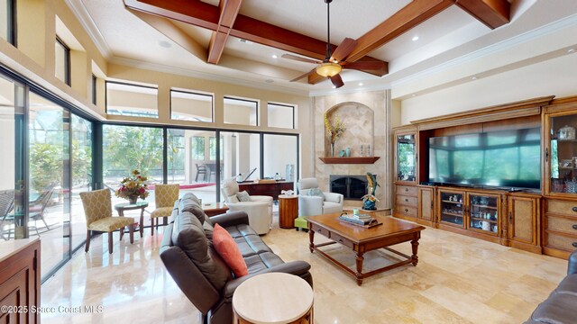 5454 Riveredge Dr, Titusville, FL 32780 - living room featuring a towering ceiling, coffered ceiling, ceiling fan, plenty of natural light, and crown molding