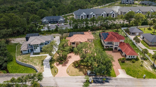 5454 Riveredge Dr, Titusville, FL 32780 - aerial view of residential area with a forest