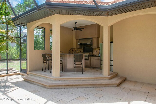 5454 Riveredge Dr, Titusville, FL 32780 - view of patio / terrace with a lanai and ceiling fan