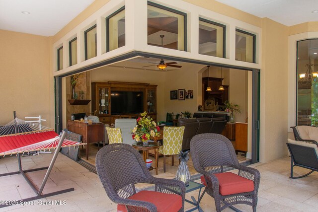5454 Riveredge Dr, Titusville, FL 32780 - view of patio / terrace featuring a ceiling fan