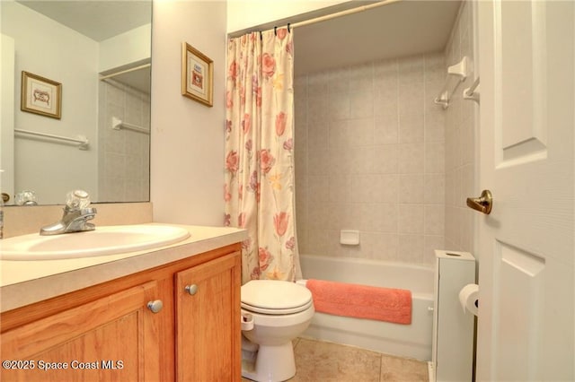 bathroom with vanity, toilet, shower / tub combo, and tile patterned flooring