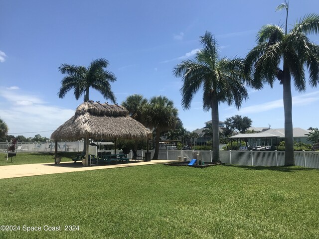 view of yard featuring a gazebo and fence