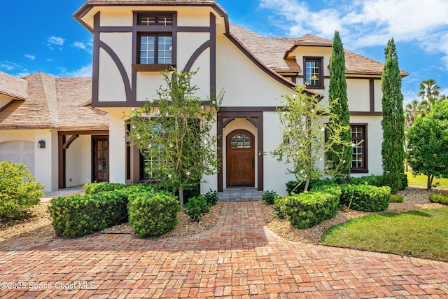 7021 S Tropical Trl, Merritt Island, FL 32952 - tudor house with stucco siding
