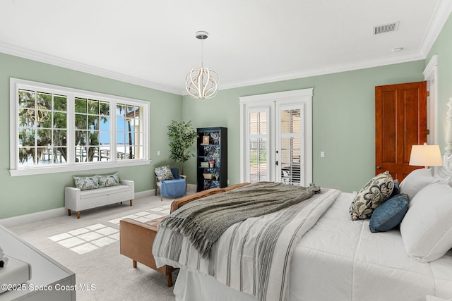 7021 S Tropical Trl, Merritt Island, FL 32952 - carpeted bedroom with crown molding, multiple windows, access to outside, a chandelier, and baseboards