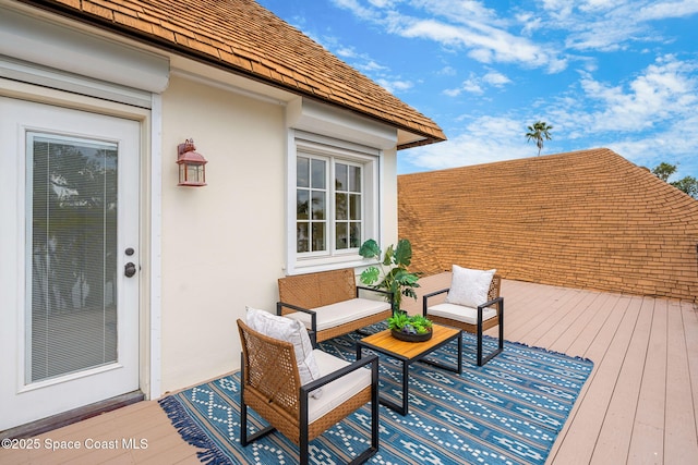 7021 S Tropical Trl, Merritt Island, FL 32952 - wooden deck with an outdoor living space