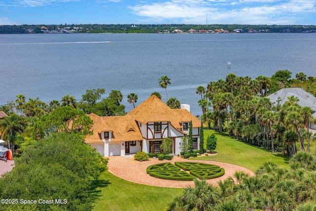 7021 S Tropical Trl, Merritt Island, FL 32952 - view of subject property featuring a nearby body of water