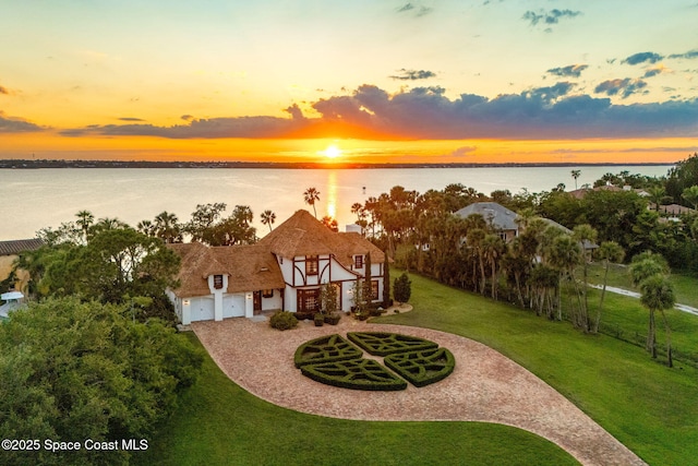 7021 S Tropical Trl, Merritt Island, FL 32952 - aerial view of property and surrounding area featuring a nearby body of water