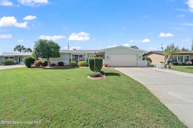 445 Park Ave, Satellite Beach, FL 32937 - ranch-style home with driveway, an attached garage, a front lawn, and stucco siding