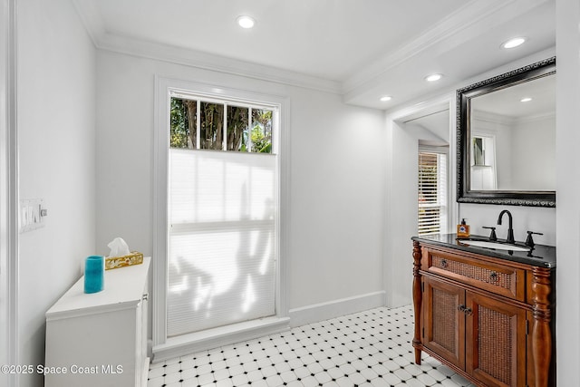 bathroom with vanity, crown molding, recessed lighting, and a wealth of natural light