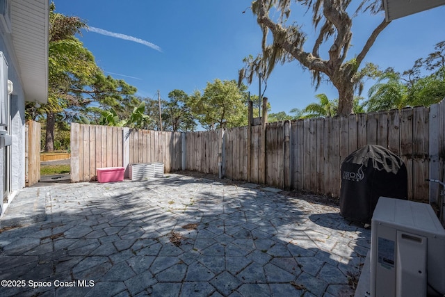 view of patio featuring a fenced backyard