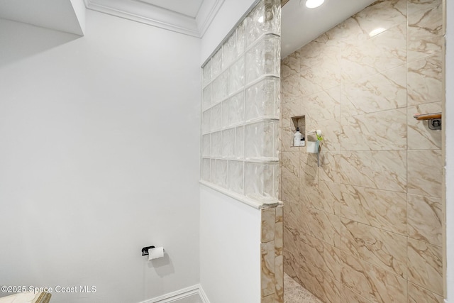 full bathroom with a walk in shower, baseboards, and ornamental molding