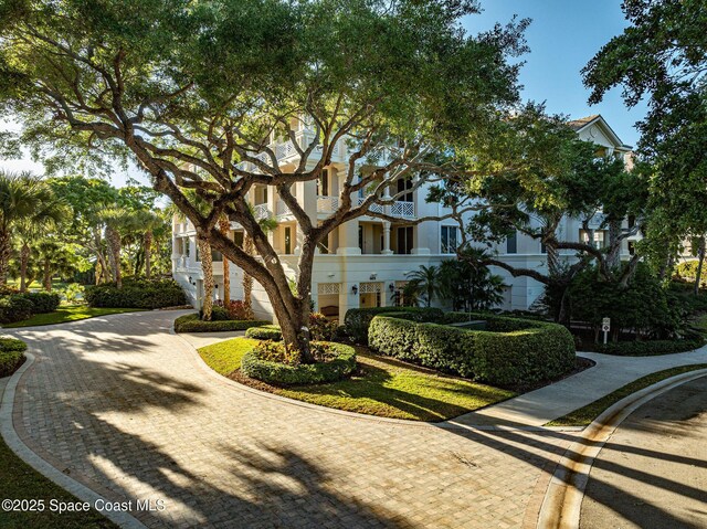 601 N Swim Club Dr Pha, Pha, Indian River Shores, FL 32963 - exterior space featuring stucco siding and decorative driveway
