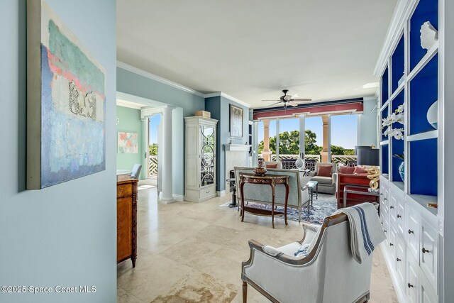 601 N Swim Club Dr Pha, Pha, Indian River Shores, FL 32963 - living area with ornamental molding and a ceiling fan