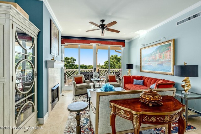601 N Swim Club Dr Pha, Pha, Indian River Shores, FL 32963 - living area featuring a ceiling fan, ornamental molding, a fireplace, and visible vents