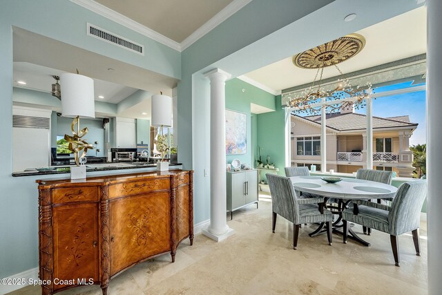 601 N Swim Club Dr Pha, Pha, Indian River Shores, FL 32963 - dining room with visible vents, ornate columns, baseboards, ornamental molding, and an inviting chandelier