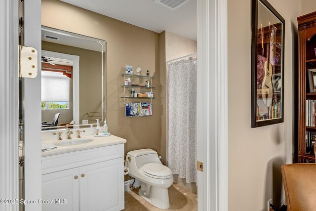601 N Swim Club Dr Pha, Pha, Indian River Shores, FL 32963 - full bathroom with visible vents, toilet, vanity, and a shower with curtain