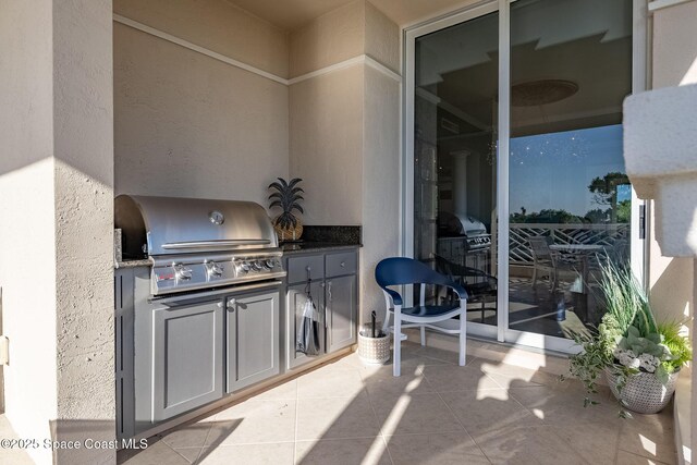 601 N Swim Club Dr Pha, Pha, Indian River Shores, FL 32963 - view of patio with area for grilling and a grill