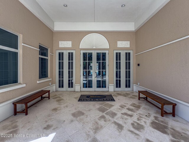 601 N Swim Club Dr Pha, Pha, Indian River Shores, FL 32963 - entrance to property with french doors and a patio area