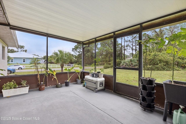 sunroom / solarium with a wealth of natural light
