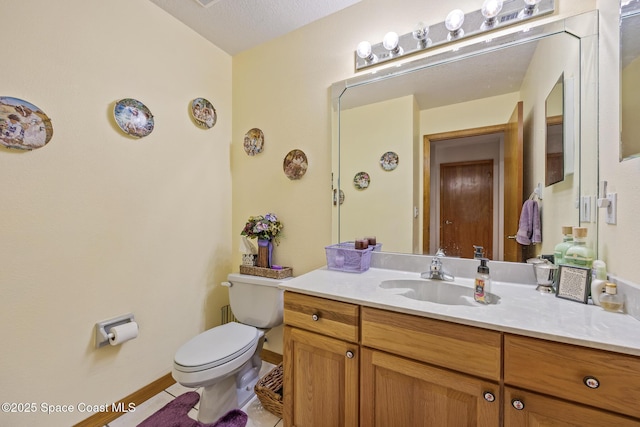 5425 James Ln, Mims, FL 32754 - bathroom featuring toilet, tile patterned flooring, and vanity