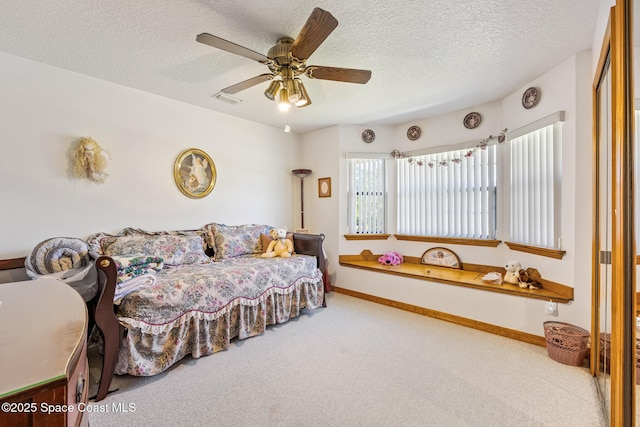 5425 James Ln, Mims, FL 32754 - bedroom featuring carpet flooring, a textured ceiling, baseboards, and visible vents