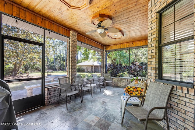 5425 James Ln, Mims, FL 32754 - unfurnished sunroom featuring ceiling fan
