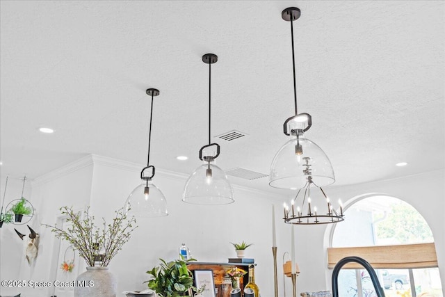 room details featuring a textured ceiling, visible vents, ornamental molding, recessed lighting, and an inviting chandelier