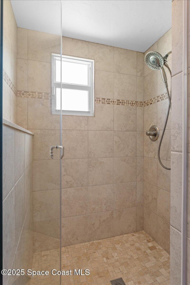 bathroom with a stall shower