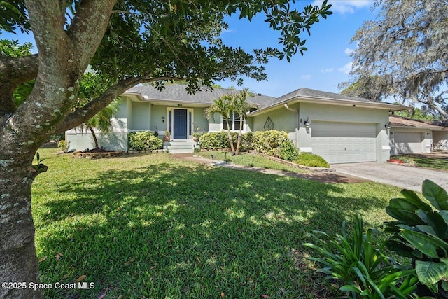 ranch-style home featuring a front lawn, driveway, stucco siding, and an attached garage