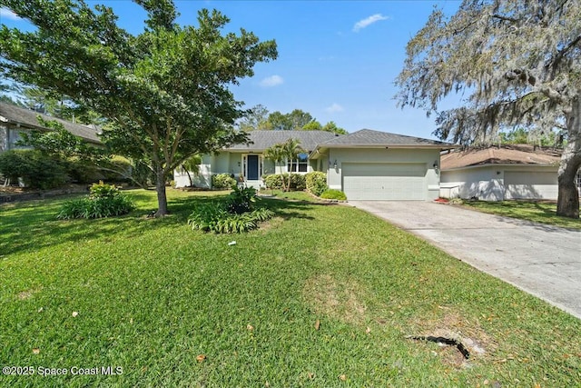 ranch-style house with a garage, concrete driveway, stucco siding, and a front lawn