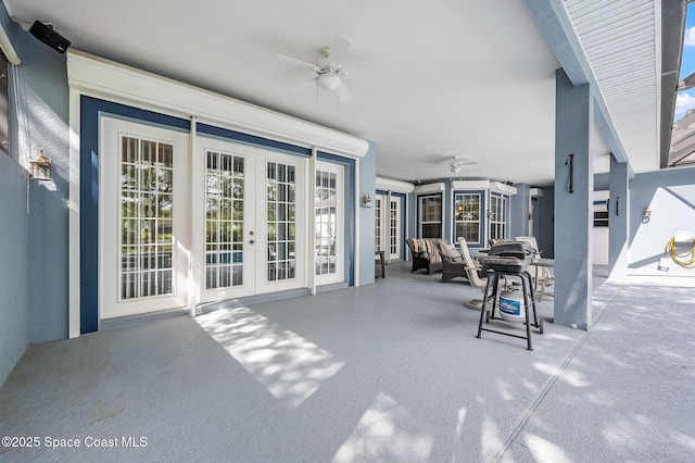 view of patio with french doors and ceiling fan