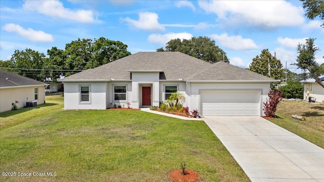 710 Mulberry St, Sebastian, FL 32958 - single story home with central air condition unit, a garage, stucco siding, and roof with shingles