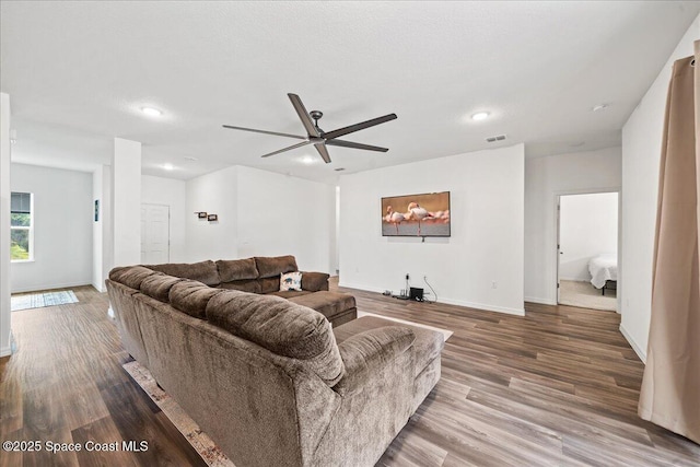 710 Mulberry St, Sebastian, FL 32958 - living room featuring recessed lighting, a ceiling fan, wood finished floors, and baseboards
