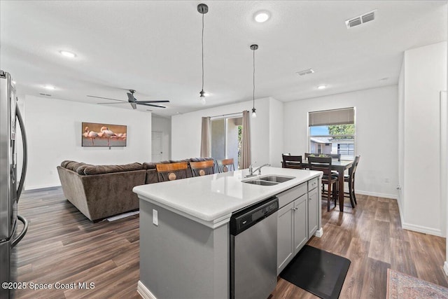 710 Mulberry St, Sebastian, FL 32958 - kitchen with dark wood-style floors, visible vents, appliances with stainless steel finishes, and a sink