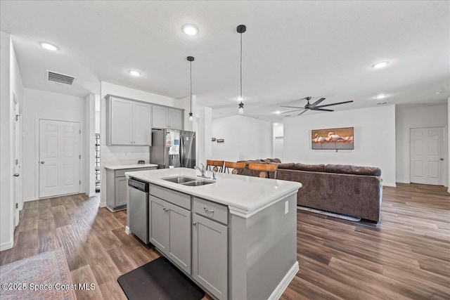 710 Mulberry St, Sebastian, FL 32958 - kitchen with visible vents, gray cabinets, stainless steel appliances, and a sink