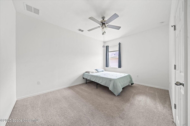 710 Mulberry St, Sebastian, FL 32958 - carpeted bedroom with a ceiling fan, visible vents, and baseboards