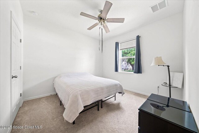 710 Mulberry St, Sebastian, FL 32958 - bedroom with visible vents, light colored carpet, and baseboards