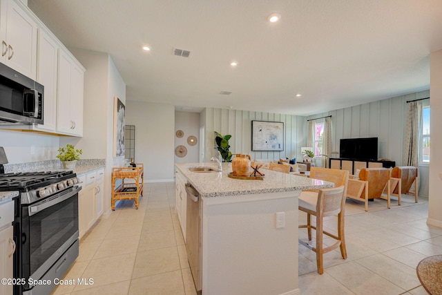 3150 Viridian Cir, Melbourne, FL 32904 - kitchen with a sink, visible vents, appliances with stainless steel finishes, and light tile patterned floors