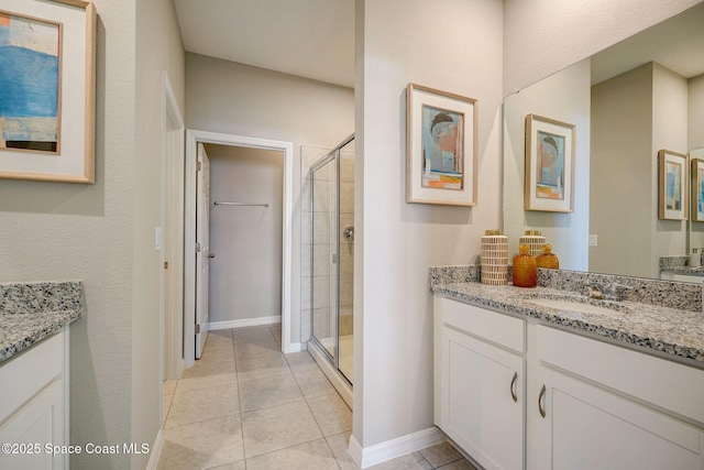 3150 Viridian Cir, Melbourne, FL 32904 - full bath with tile patterned flooring, vanity, baseboards, and a shower stall