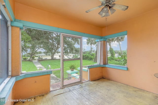 1632 Water Dr NE, Palm Bay, FL 32905 - unfurnished sunroom with a ceiling fan