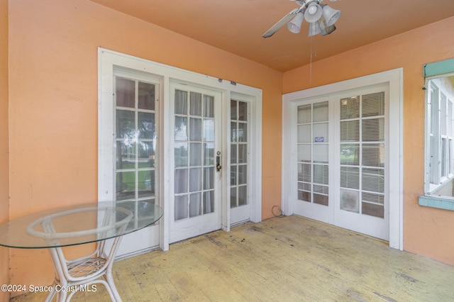 1632 Water Dr NE, Palm Bay, FL 32905 - view of patio / terrace featuring ceiling fan and french doors