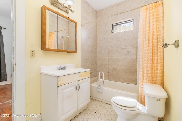 1632 Water Dr NE, Palm Bay, FL 32905 - full bath featuring tile patterned floors, toilet, vanity, and shower / bath combo