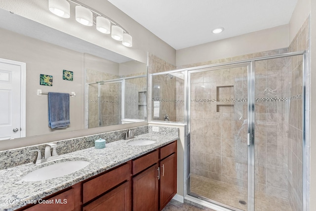 759 Fiddleleaf Cir, Melbourne, FL 32904 - full bathroom featuring double vanity and a shower stall