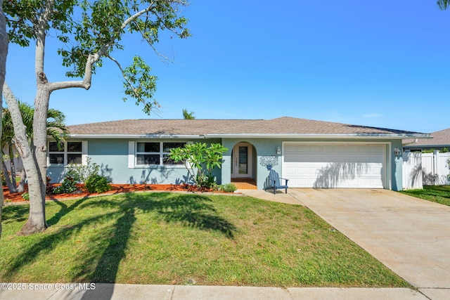 1445 Centaurus Ct, Merritt Island, FL 32953 - ranch-style house with an attached garage, stucco siding, and concrete driveway